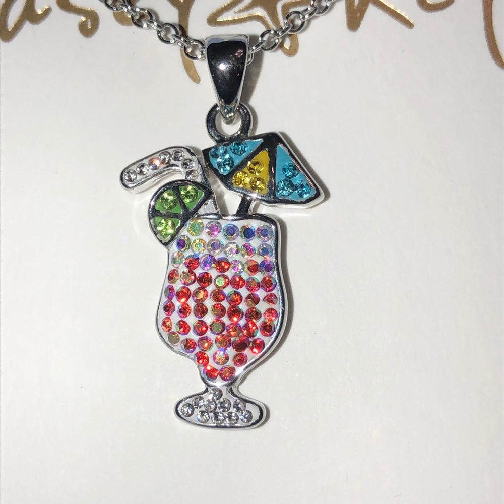 NIB umbrella drink crystal and silver plated pendant with chain.